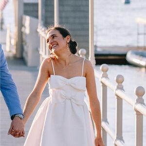 Stylish White Dress with Bow Accents
